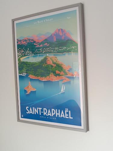 a poster of santragalilla island in the ocean at Studio rénové avec terrasse ST RAPHAEL in Saint-Raphaël