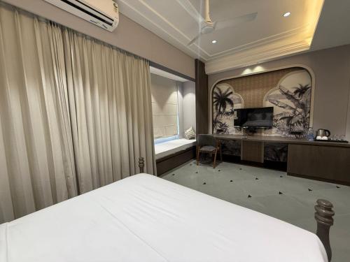 Letto o letti in una camera di The Luxury Tiger at Lake Pichola