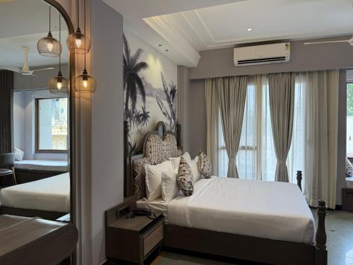 Letto o letti in una camera di The Luxury Tiger at Lake Pichola