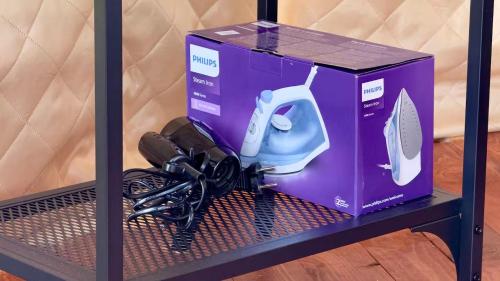 a purple box on a shelf with a hair dryer at Secluded Dome Retreat near Elena & Bikes 