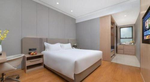 Dong Cheng Hotelにあるテレビまたはエンターテインメントセンター