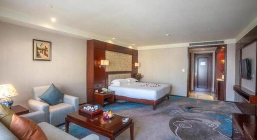 Dong Cheng Hotelにあるベッド