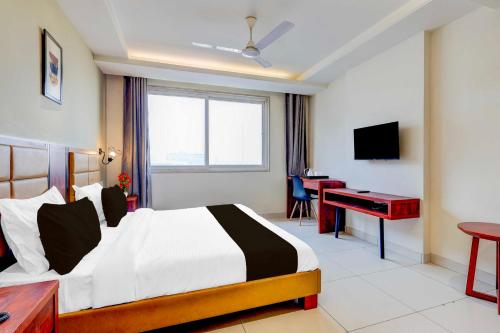 Katil atau katil-katil dalam bilik di Collection O Sector 39 Medanta