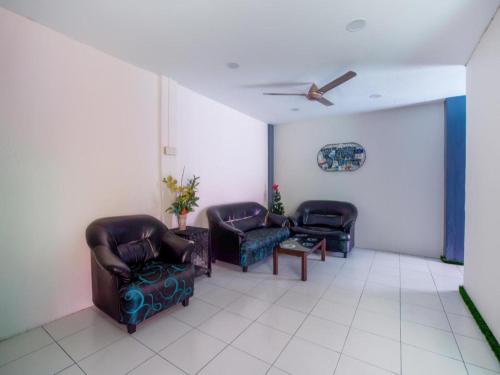 Posezení v ubytování OYO 89895 Senses Budget Hotel