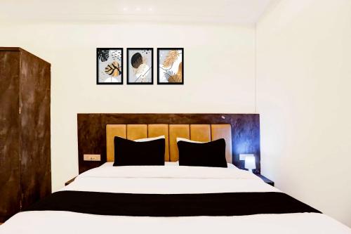 Katil atau katil-katil dalam bilik di Super Townhouse Pahadiya