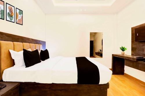 Katil atau katil-katil dalam bilik di Super Townhouse Pahadiya