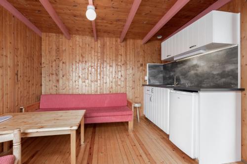 TV a/nebo společenská místnost v ubytování Pluscamp Sandvik