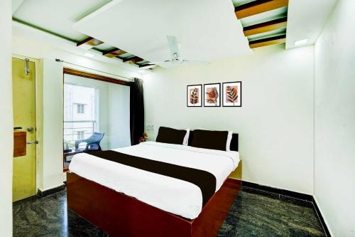 Katil atau katil-katil dalam bilik di Townhouse Mahabalipuram