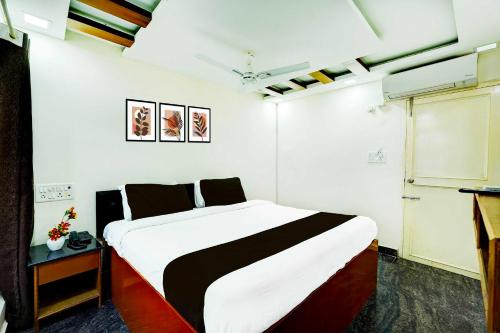 Katil atau katil-katil dalam bilik di Townhouse Mahabalipuram