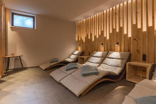a bedroom with two beds and a window at Hotel Sonne in Brand