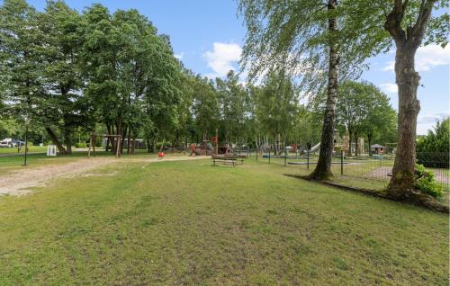 a park with a picnic table and trees at Amazing Home In Winsen, Aller With Wifi in Winsen Aller