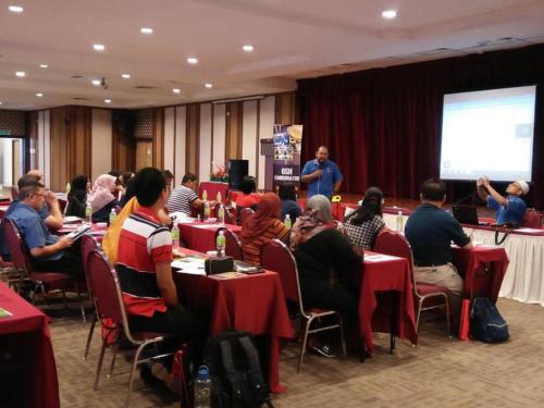 a group of people sitting at tables in a room at The Regency Hotel Seri Warisan in Taiping
