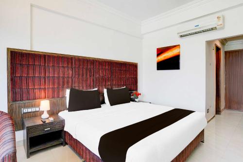 Letto o letti in una camera di Super Townhouse Bharuch Railway Station