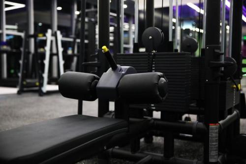 a gym with chairs with a toothbrush sitting on them at Radegast Hotel CBD in Beijing