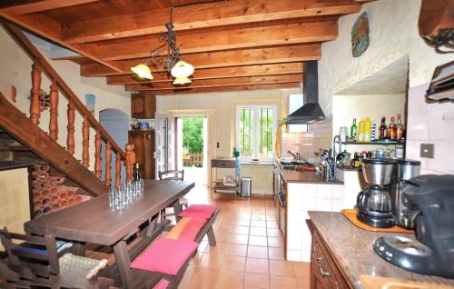 Kuchyň nebo kuchyňský kout v ubytování Maison Paisible Montagne