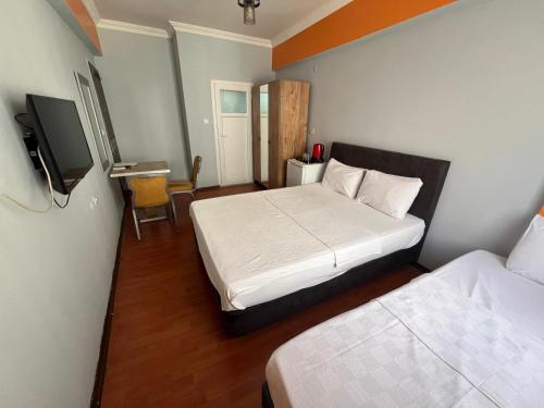 Katil atau katil-katil dalam bilik di City House Hotel