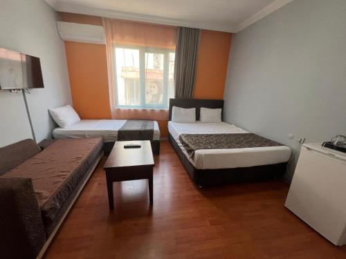Katil atau katil-katil dalam bilik di City House Hotel
