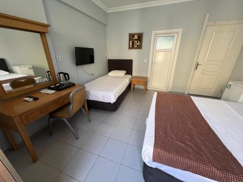 Katil atau katil-katil dalam bilik di City House Hotel