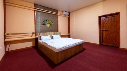 Ένα ή περισσότερα κρεβάτια σε δωμάτιο στο Pattaya SPA