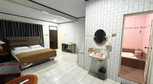 Ванная комната в Sumber Ria Hotel