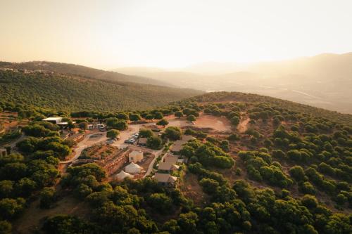 an aerial view of a park in a valley at Rom Farm by Glow - חוות רום in Kammon