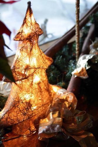 a christmas ornament of a christmas tree at Hotel Stella Alpina in Falcade