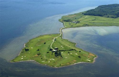 an island in the middle of a body of water at Tjebberupgaard B&B in Holbæk