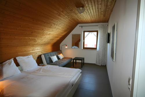 Postel nebo postele na pokoji v ubytování Gästehaus Perlmuschel