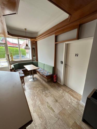 a living room with a couch and a table at Urlaub in Schlossnähe in Artstetten