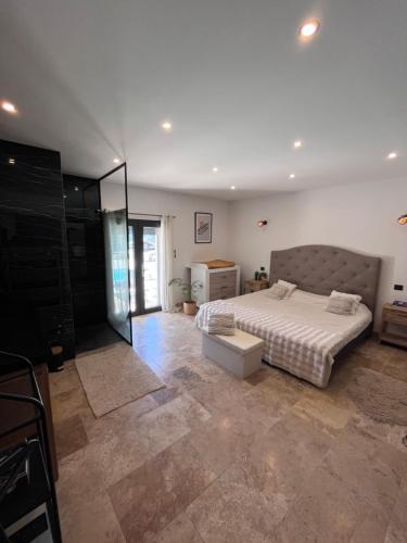 Posezení v ubytování Villa haut de gamme avec piscine et jacuzzi