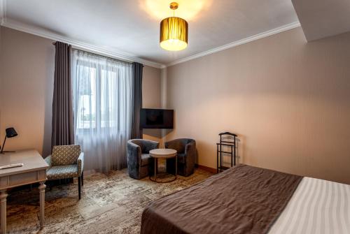 Ayvazovsky Hotelにあるベッド