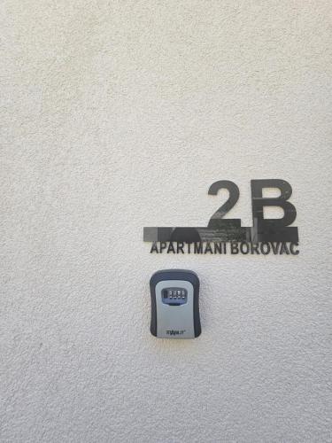 Πιστοποιητικό, βραβείο, πινακίδα ή έγγραφο που προβάλλεται στο Apartmani Borovac Šparadići