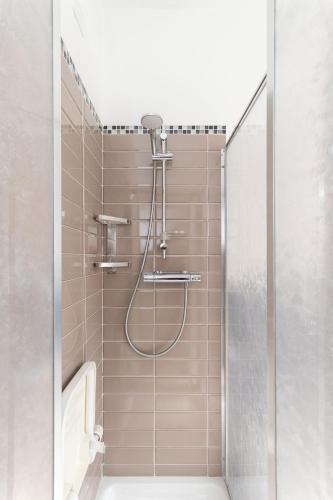 Ένα μπάνιο στο Apartment facing the sea and Navebus Porto Antico