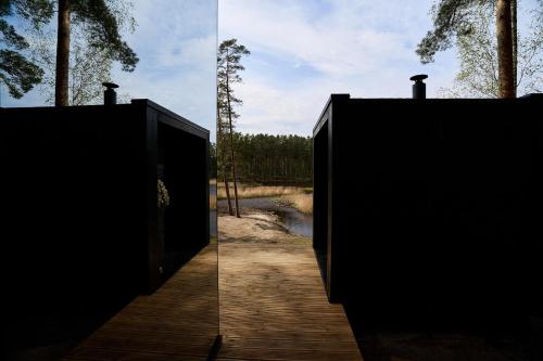 two images of a door on a wooden walkway at Bejas Lux Mirror Houses 