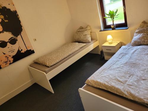 Una cama o camas en una habitación de Haus in jagel