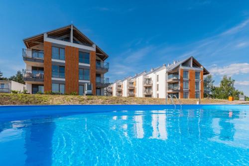 Bazén v ubytování Apartamenty - Krynica Morska Enklawa I nebo v jeho okolí