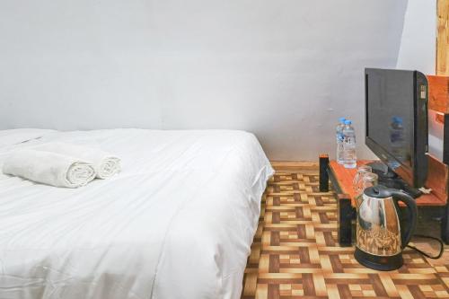 TV a/nebo společenská místnost v ubytování Valley Ciater Subang Mitra RedDoorz