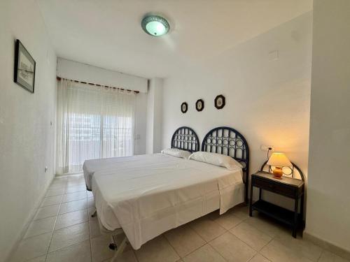 Posteľ alebo postele v izbe v ubytovaní Apartamentos APOLO16 (I-15º-70)