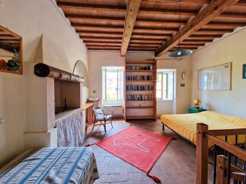 En eller flere senge i et værelse på Casa Belladonna Rio Marina