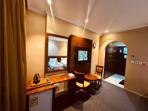 Diouf Al-Mquam Al-Masy Hotel Free shuttle service to the Haramにあるベッド