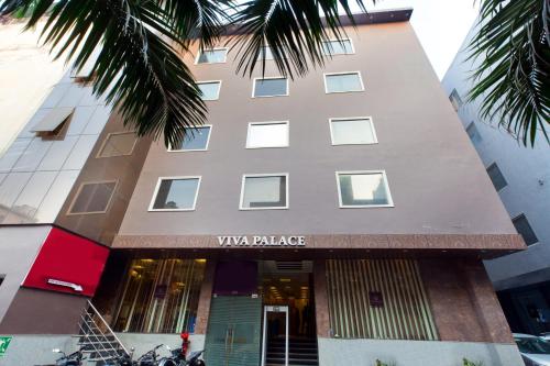a view of the viva palace hotel in singapore at VIVVA Premier Delhi Aerocity FREE Airport Pick Up in New Delhi
