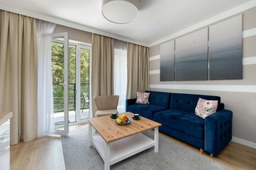 Nadmorski Apartament w Pobierowie z Parkingiem oraz Basenem by Noclegi Renters