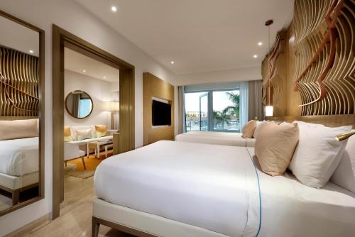 Postel nebo postele na pokoji v ubytování Paradisus Grand Cana, All Suites - Punta Cana -All Inclusive