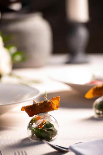 a close up of a piece of food on a table at KRESTEN ROYAL Euphoria Resort in Kallithea Rhodes