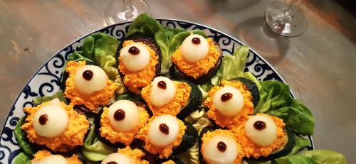 a plate of food with food with eyes on it at Beskid Masala in Ropki