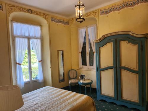 Postel nebo postele na pokoji v ubytování Hotel Alla Riviera