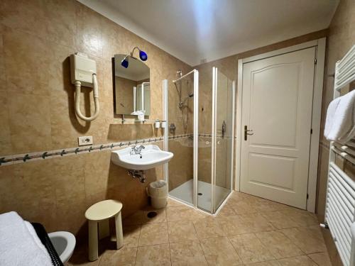 Koupelna v ubytování Hotel Alla Riviera