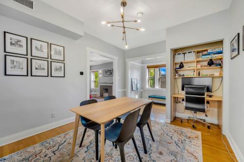 a dining room with a table and chairs at Steps to the Lakefront! This Uptown Beauty is Everything You Need for a Perfect Chicago Getaway condo in Chicago