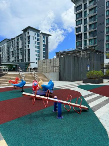 a playground with a bunch of scissors on a carpet at Kuching Vivacity Jazz Suite 4 YM Homestay 3 bedroom 2 bathroom in Kuching