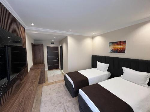 Postel nebo postele na pokoji v ubytování Hotel Parlament